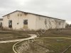 производственную базу(бывший консервный завод)