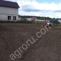 Вспашка земельного участка трактором