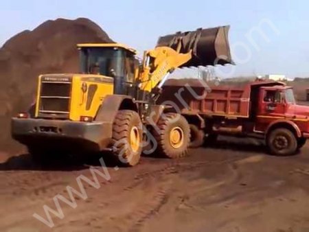 Фронтальный погрузчик с навесным оборудованием