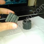 вал и шестерня редуктора хода экскаватора