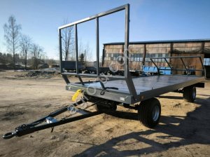 Прицеп рулоновозный 8 тонн тракторный для перевозки рулонов и тюков сена и соломы