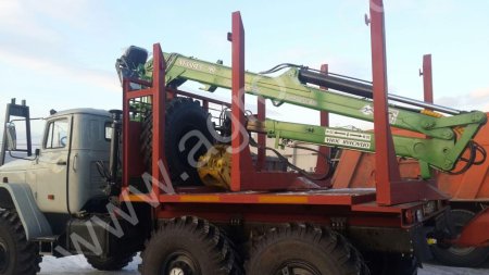 Лесовоз Урал 43204 с манипулятором Атлант-С 90