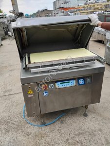 Конвейерный вакуумный упаковщик Multivac C700