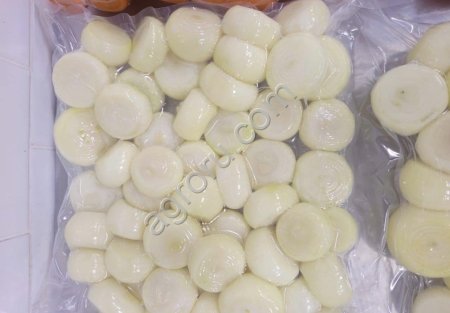 Лук в вакуумной упаковки