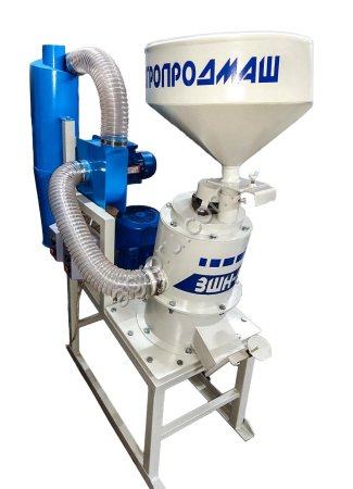 Шелушильная машина для зерна ЗШН-01 с наклонной осью вращения.