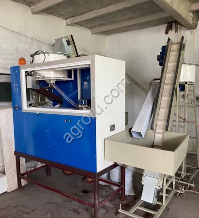 Линия нанесения тиснения на крышку бутылки