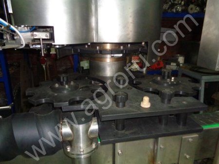 Укупор KHS для укупоривания пластиковой пробкой шампаского и камю коньяка.