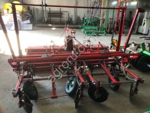 Пленкоукладчик двухрядный с почвофрезой