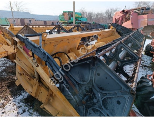 Комбайн New Holland TC-56