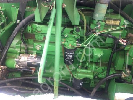 Зерноуборочный комбайн JohnDeere-1550CWS