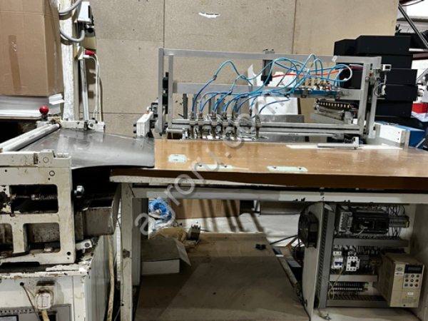 Крышкоделательная машина