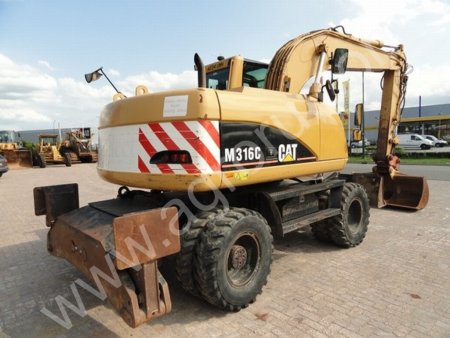 экскаватор Котерпиллер колесный CAT 316