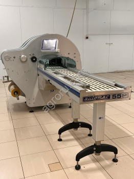 автоматическая упаковочная машина automac piu для упаковки пищевых продуктов на подложке в стрейч пленку