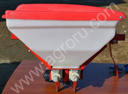 Устройство дозированного внесения сыпучих компонентов.